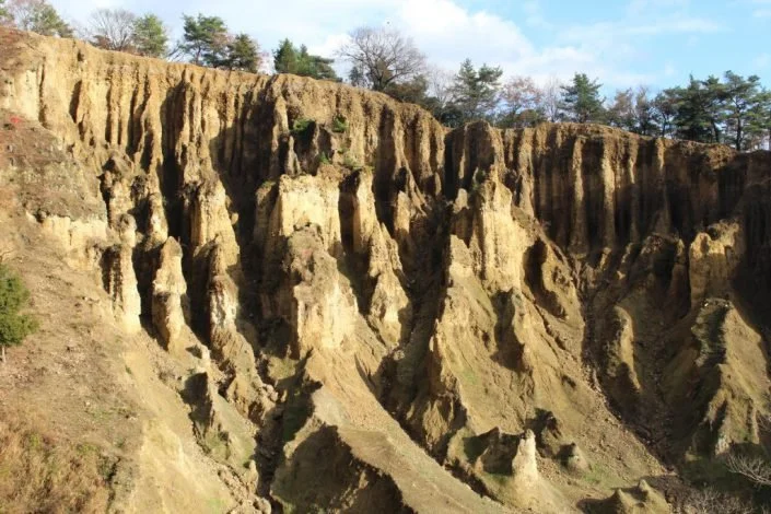 Towering curtain-like earth pillars of Awa no Dochū in Tokushima — a million-year-old geological wonder in rural Japan.