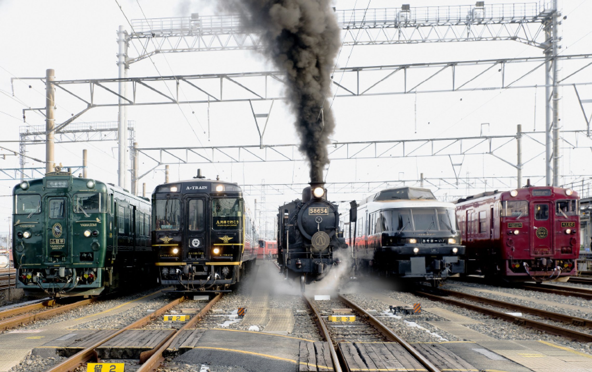 Historic and modern JR Kyushu trains lined up together at Kokura General Rolling Stock Center — a rare behind-the-scenes railway experience in Kitakyushu.
