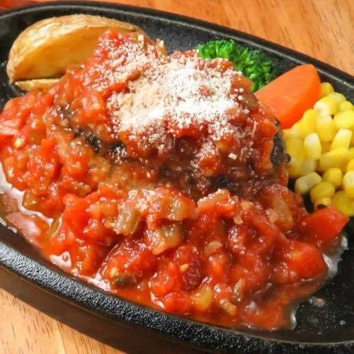 Young girl dressed in traditional Japanese attire hitting a large taiko drum during a cultural festival.