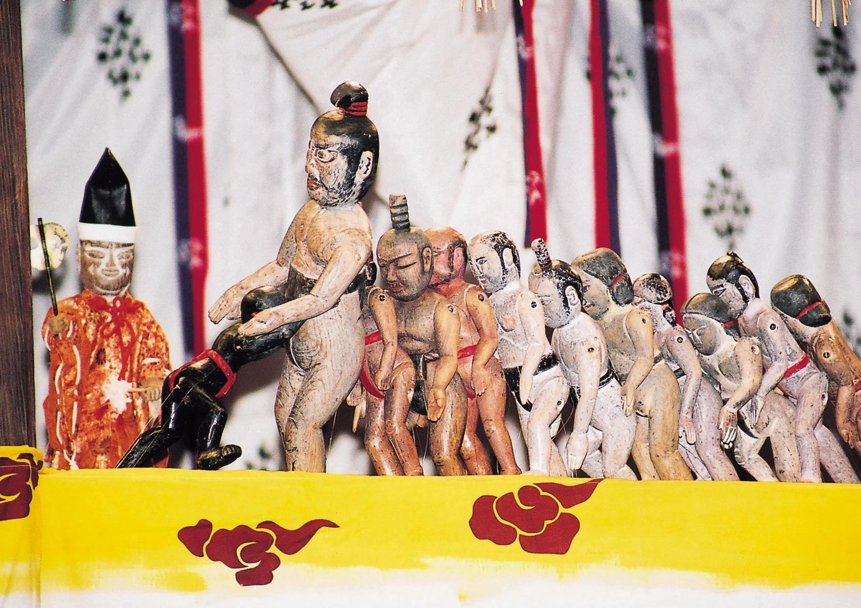 Hand-carved wooden puppets of Hachimankohyo Shrine in Fukuoka, brought out only once every four years for a sacred dance and sumo ritual.
