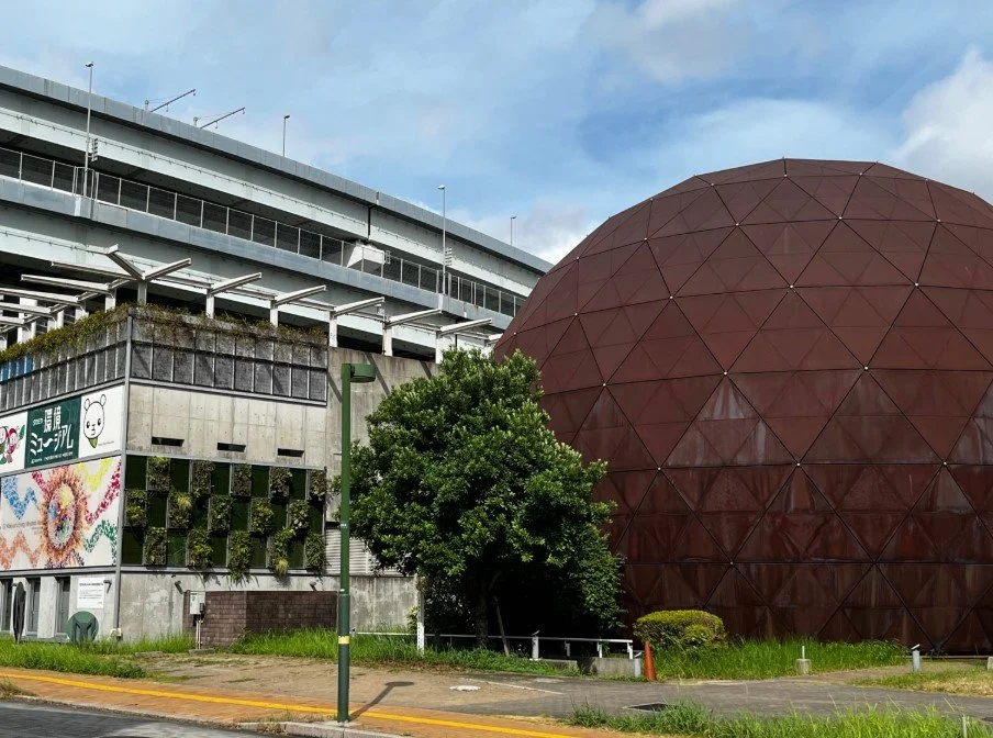 Exterior of Takamiya Environmental Museum in Kitakyushu — a landmark of Japan's journey from pollution to SDGs model city.