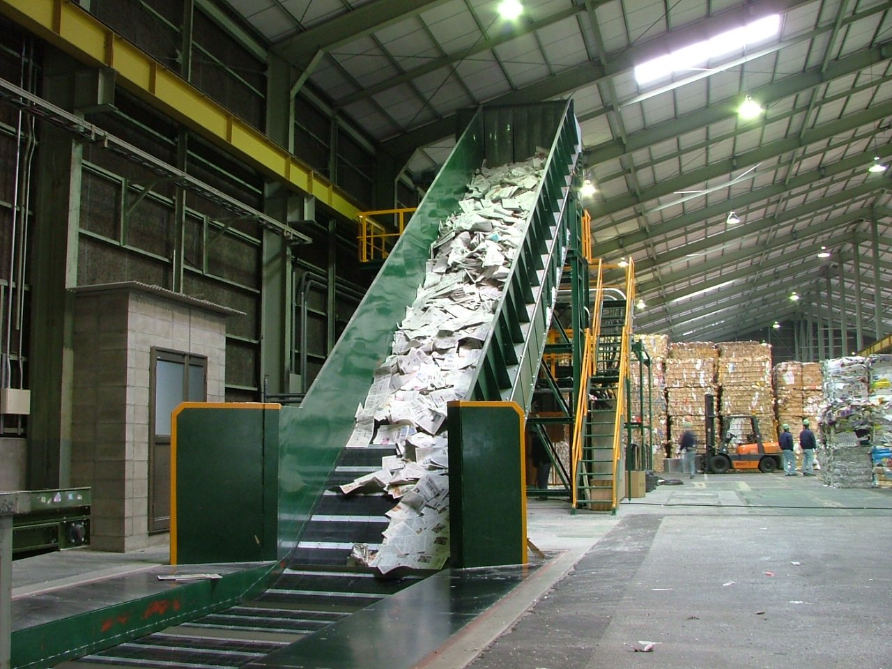 Inside a working paper recycling facility in Kitakyushu — where waste is sorted and transformed into reusable resources daily.