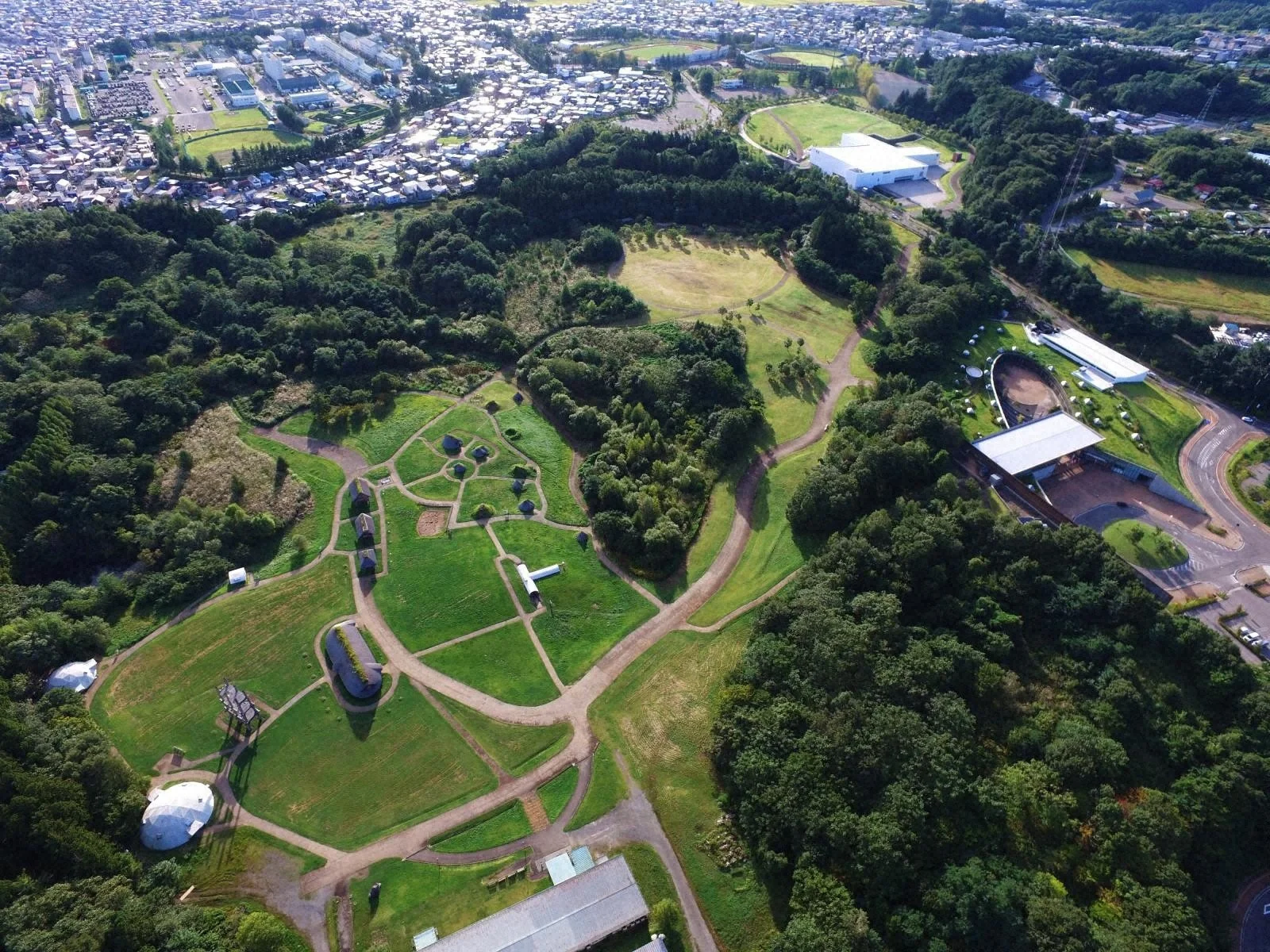 Aerial view of Sannai Maruyama Jomon ruins in Aomori — a vast 5,900-year-old UNESCO World Heritage settlement in northern Japan.