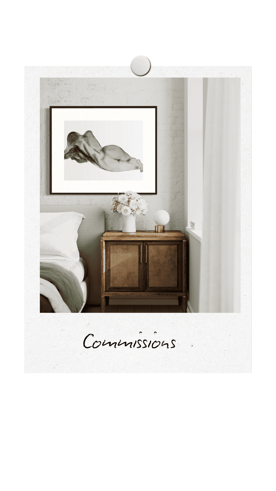 A bedroom setting with the corner of a bed on the left and a small wooden bed side table on the right. On the wall is a black framed commissioned artwork in charcoal of nude woman showing her back and buttocks.