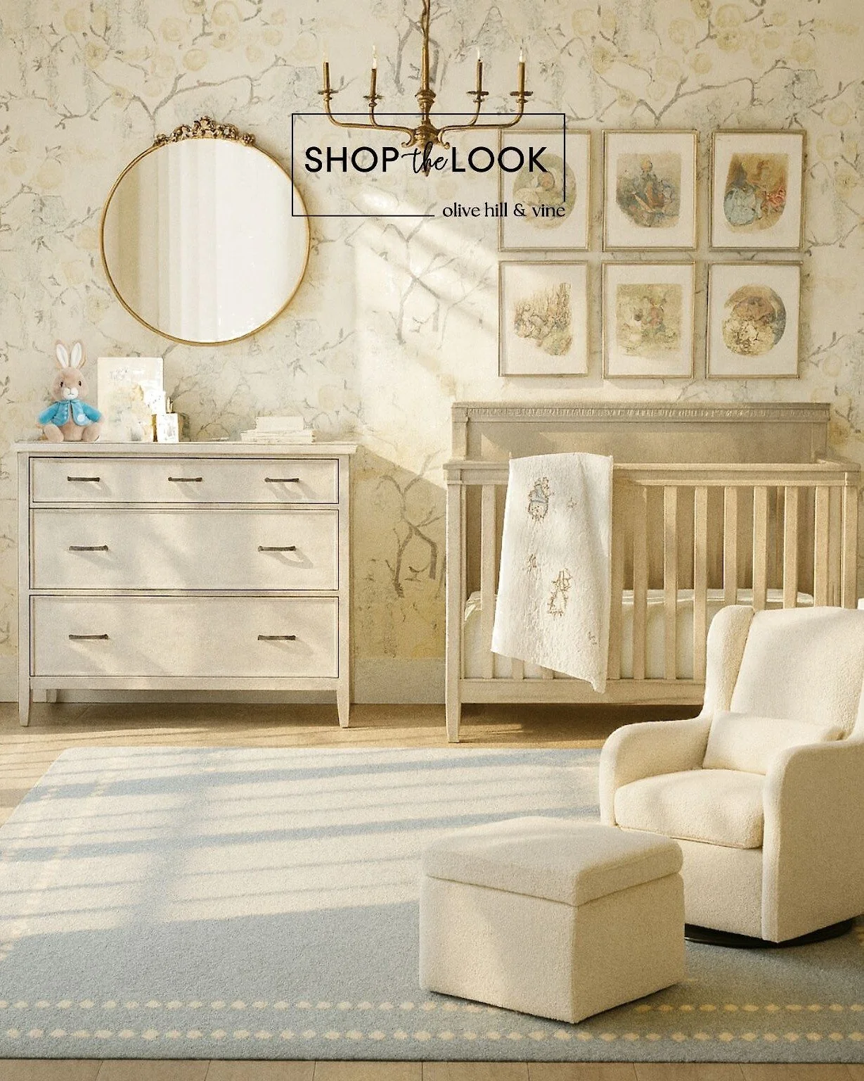 A storybook dream comes alive in this Peter Rabbit nursery&mdash;complete with chinoiserie wallpaper, elegant chandelier, convertible crib, and swivel glider. Pops of blue and playful accents add timeless charm and whimsy to this serene design. 

Com