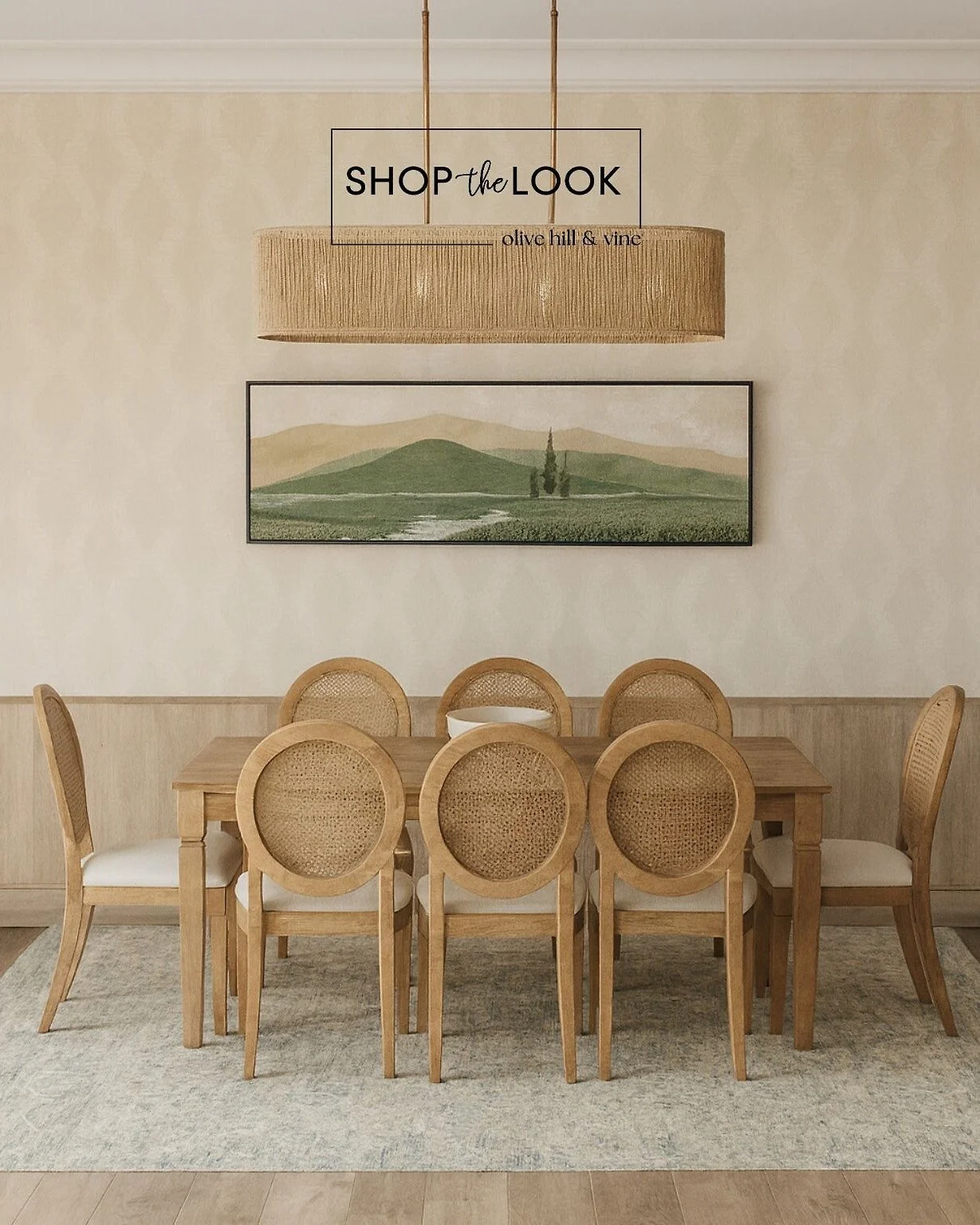Natural textures meet timeless charm in this refined dining space. A diamond-pattern wallpaper, sage landscape art, rope-wrapped chandelier, and oval cane chairs gather around a wood table&mdash;offering warmth, texture, and easy elegance for everyda