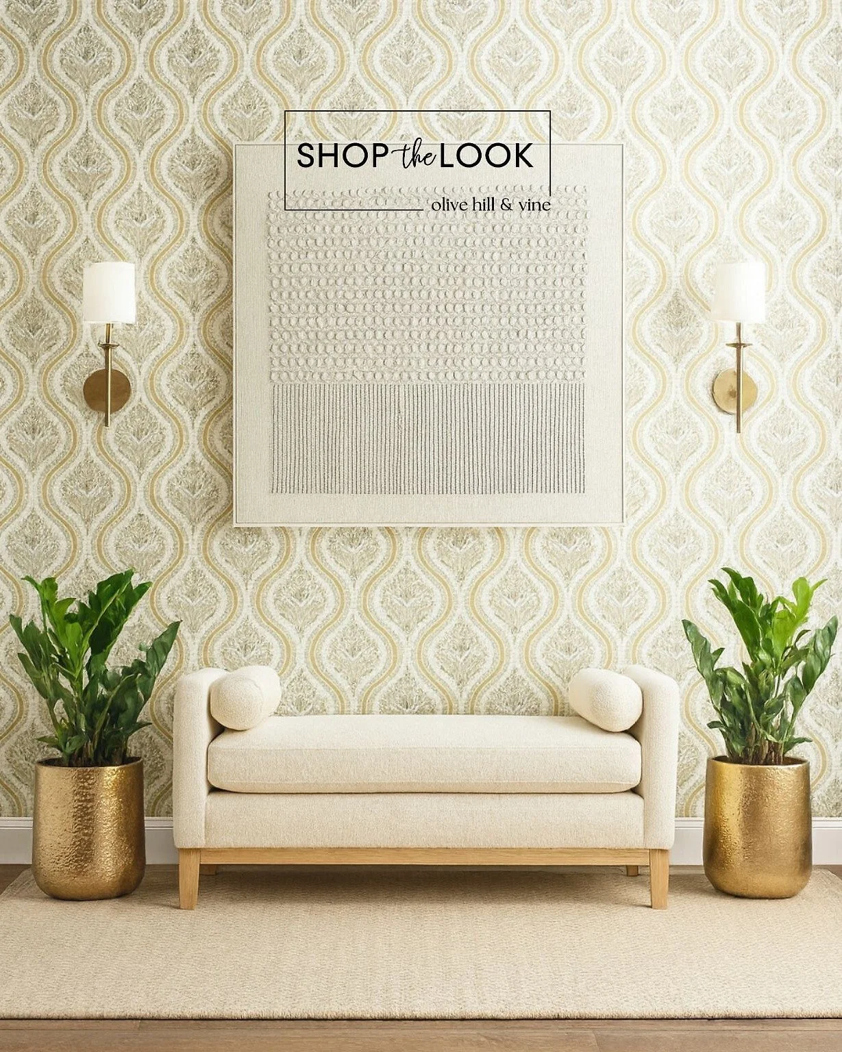 Rich textures meet timeless charm in this elegant entryway. Damask wallpaper, aged brass sconces, and boucle seating pair beautifully with gold planters and lush greenery&mdash;offering a warm, welcoming look that&rsquo;s effortlessly sophisticated. 