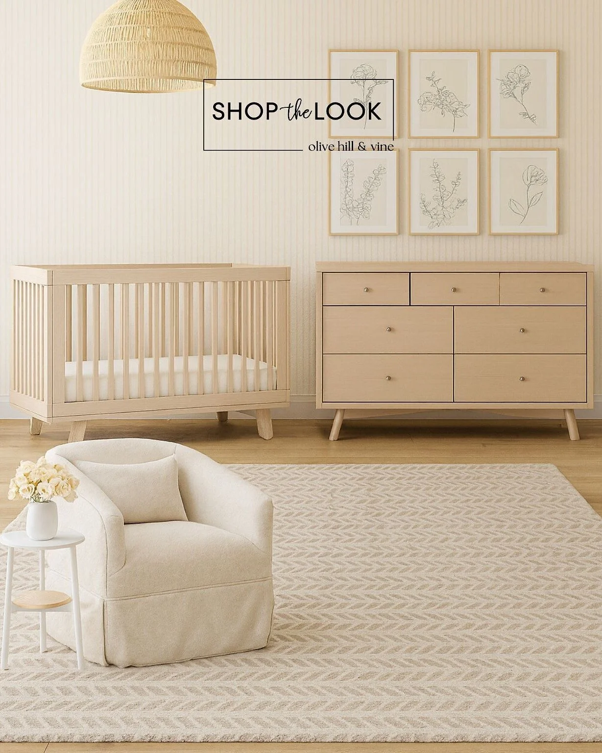 Soft neutrals meet natural textures in this serene nursery. The 3-in-1 convertible crib, botanical art, and woven rattan pendant light bring warmth and simplicity together&mdash;proof that minimal can still feel wonderfully inviting. 

Comment SHOP b