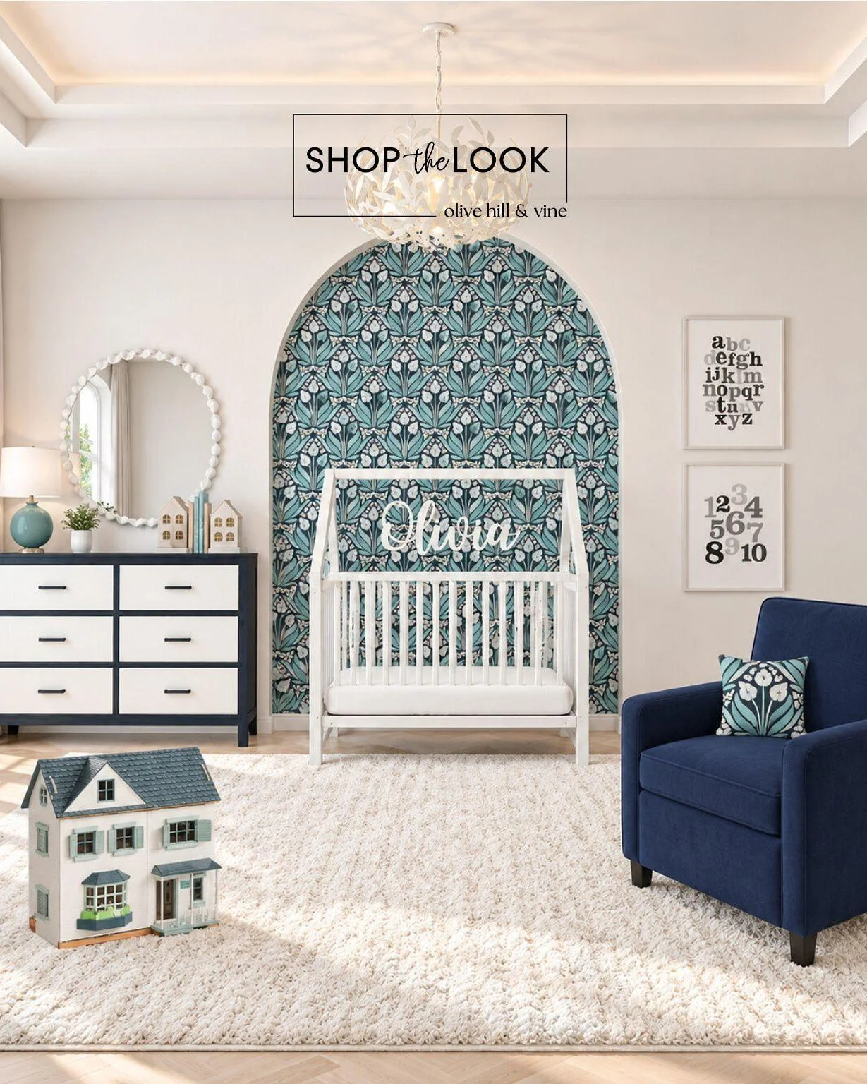Playful pattern meets polished style in this charming nursery. A botanical arch makes a beautiful statement, while rich navy, soft aqua, crisp white, and whimsical details give the room a fresh, sophisticated personality.

Follow us + comment &ldquo;