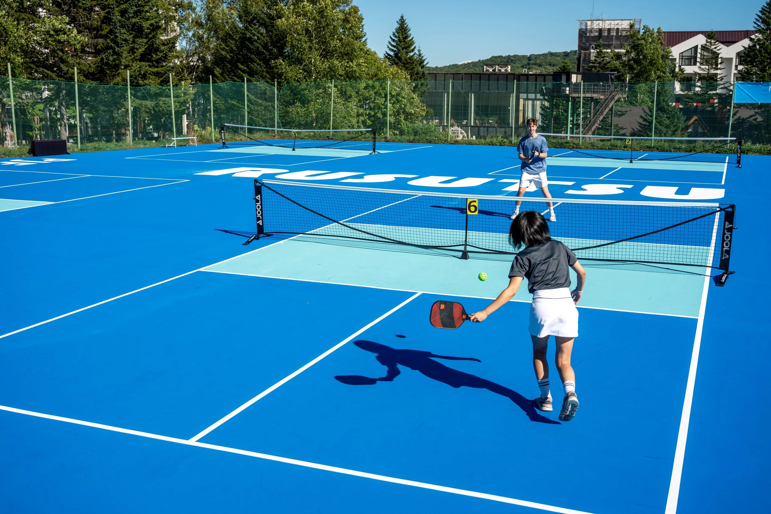 People Playing on a Pickleball Court - Pickleball - Rusutsu