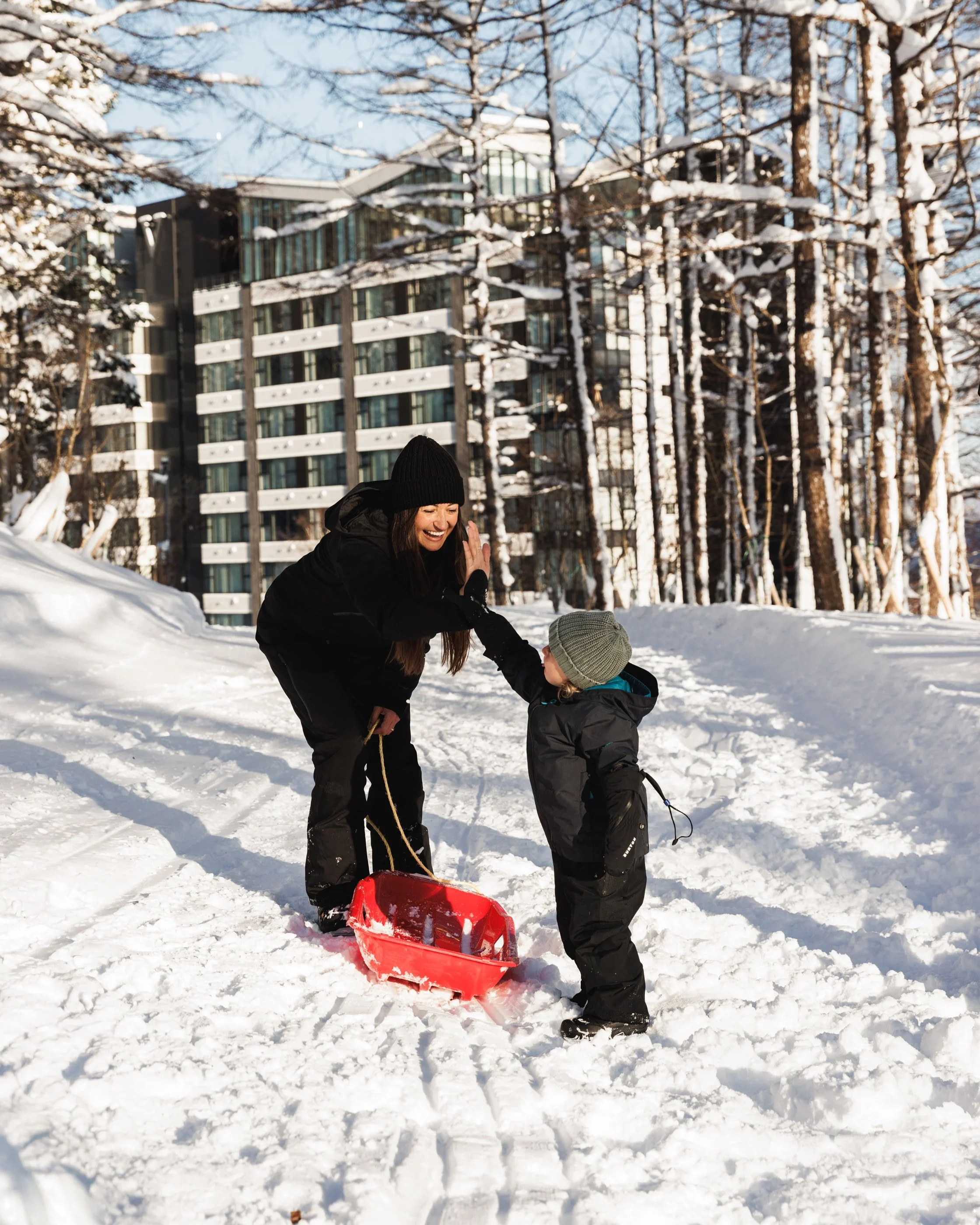 Family Enjoying Snow Outdoors, Photo by Eyes of a Nomad - The Vale Rusutsu - Rusutsu