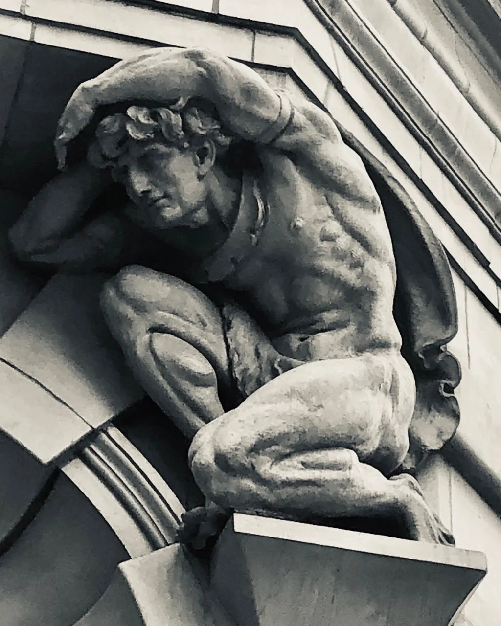 Good morning: more astonishing buildings in Manchester from its 1890s glory days - terracotta figure from the Tootall Building: warmest wishes.