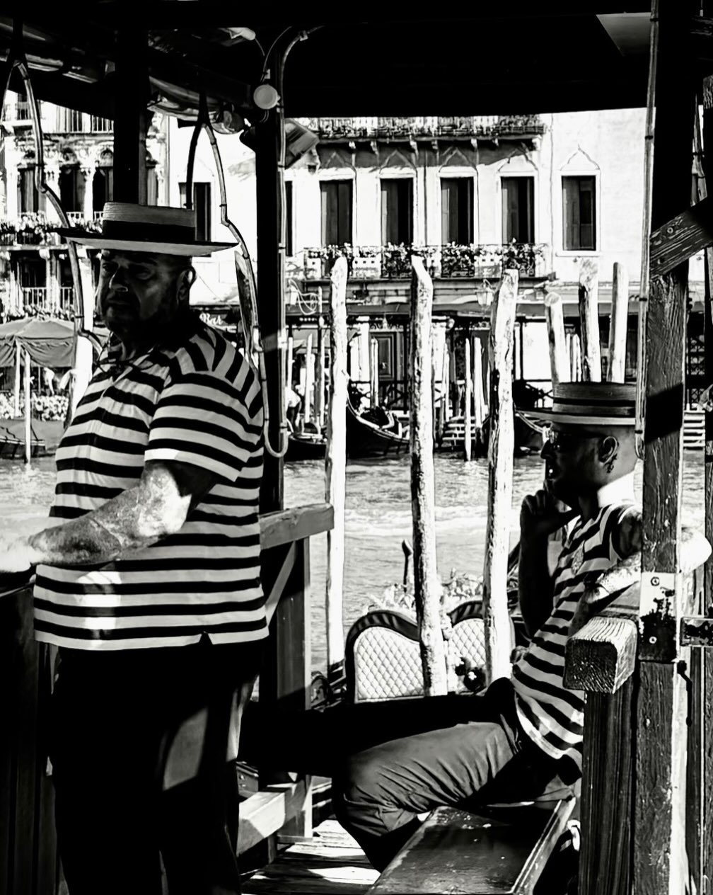 Good afternoon: gondoliers at rest - reminded me of a Whistler painting: warmest wishes.