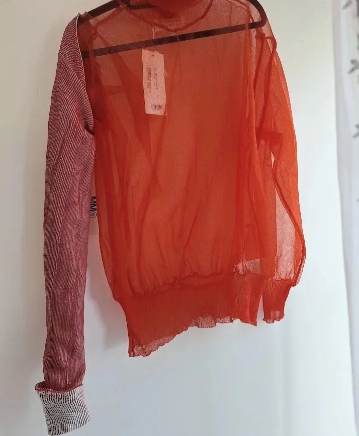 one sleeve from Margiela reversible