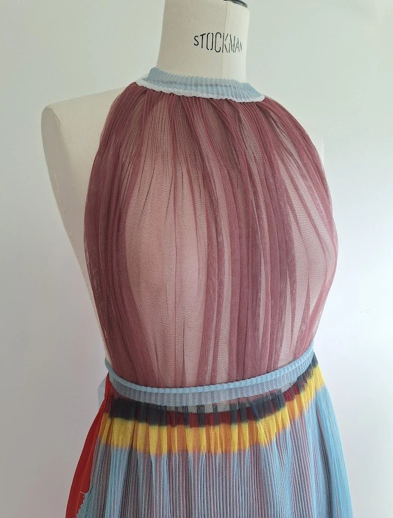 bib cover made from Dries van Noten mesh