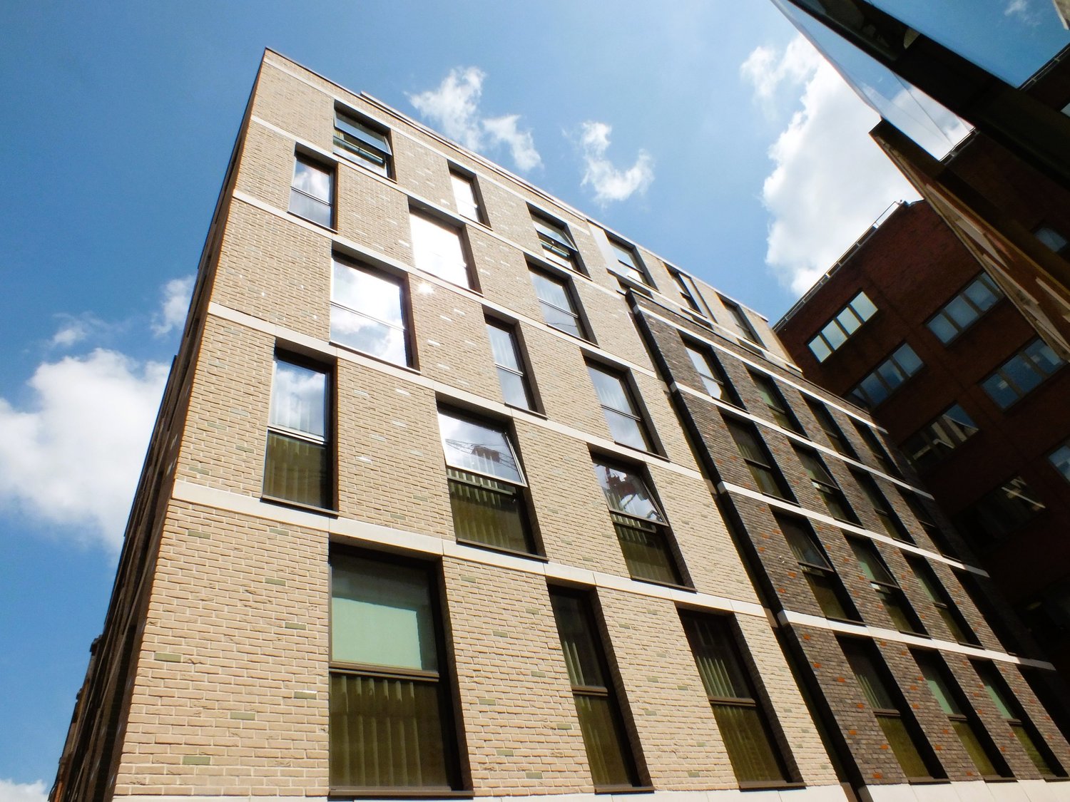 Innovations in Brick Slip Cladding Systems: Exploring FastClad Technology