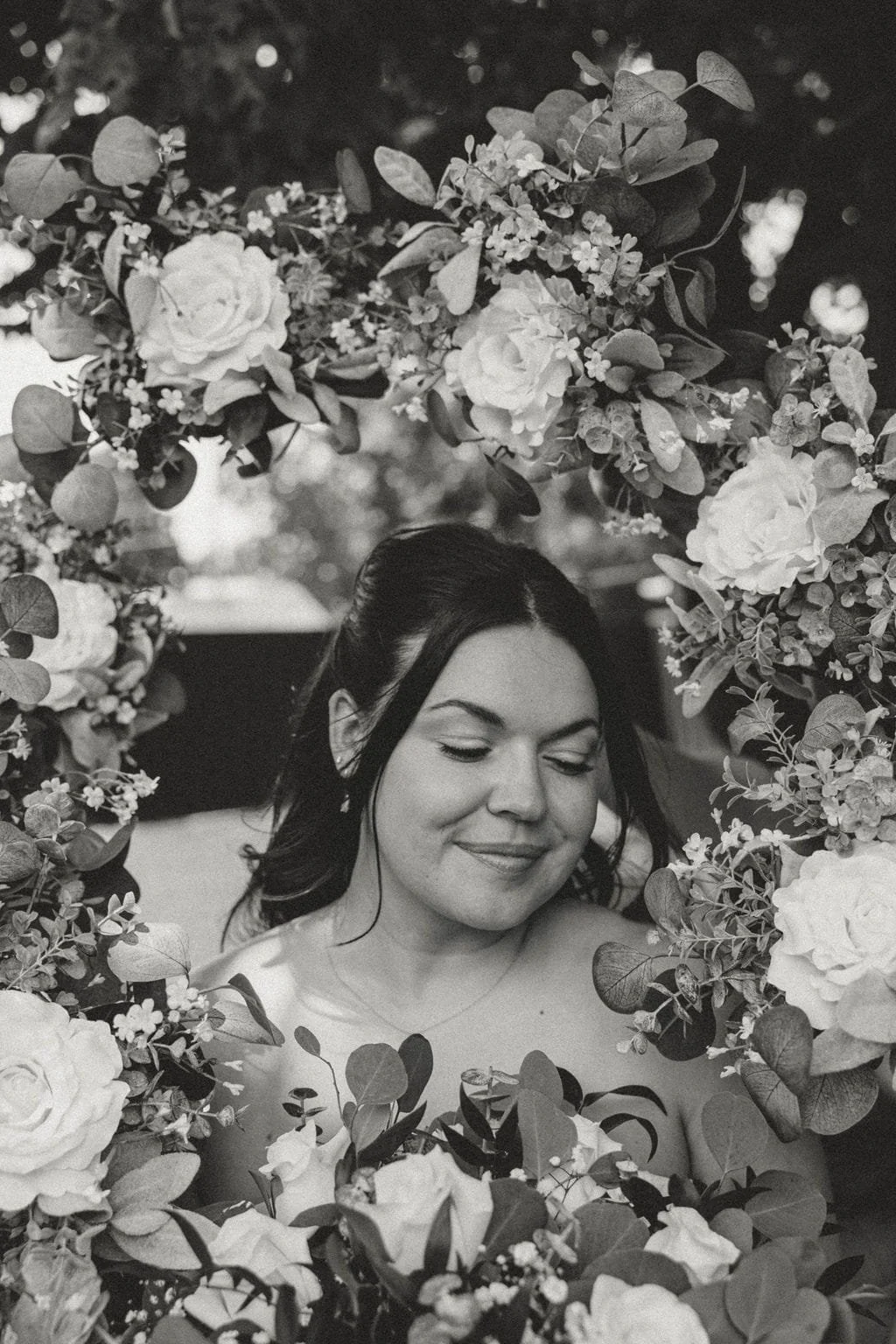 bride-floral-arch-black-and-white-portrait.jpg