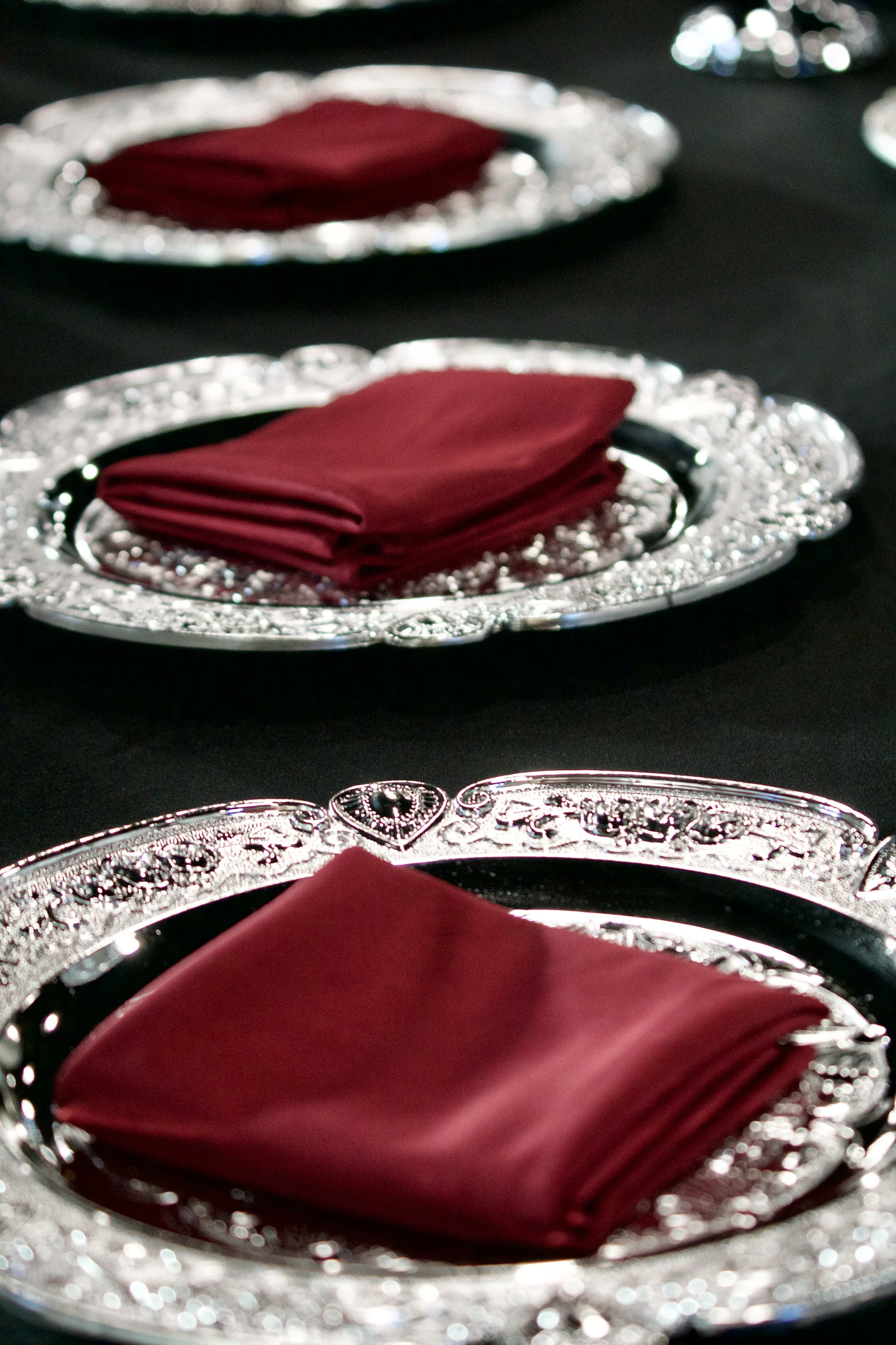 wide angle of Gatsby reception tables and chairs with crystal centerpieces