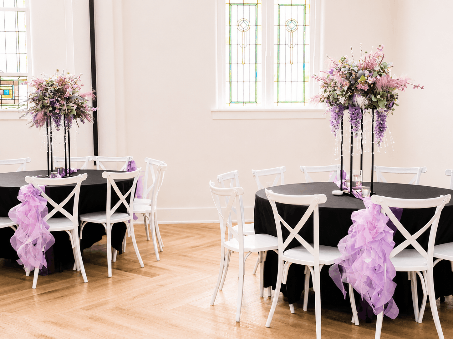 kaleidoscope-weddings-enchanted-stainedglass-round-tables.png