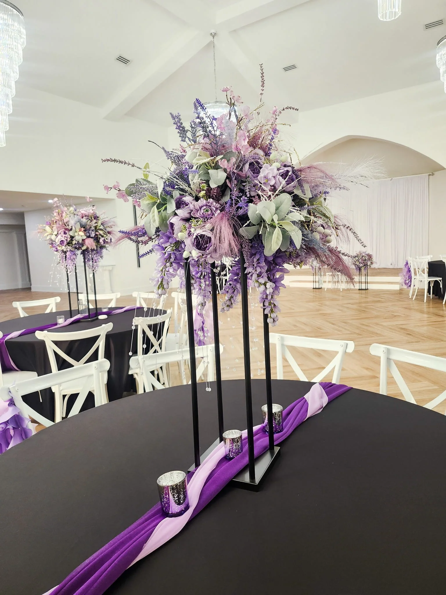 kaleidoscope-weddings-enchanted-tall-lavender-centerpiece-reception.jpg