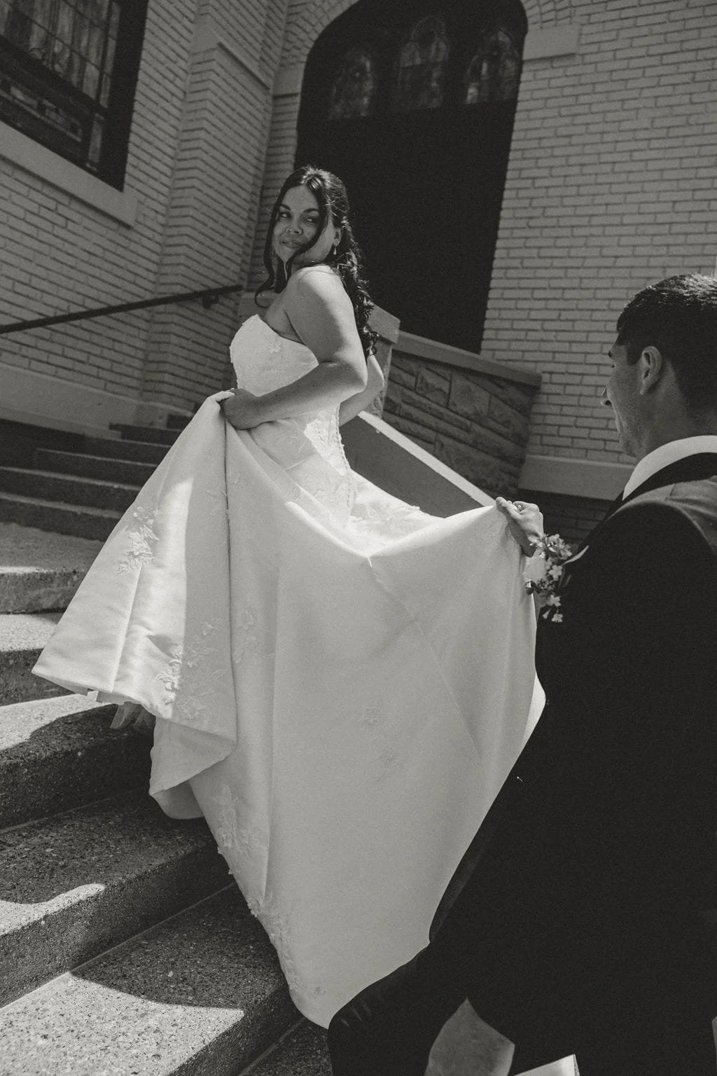 bride-walking-church-steps-wedding-dress.jpg