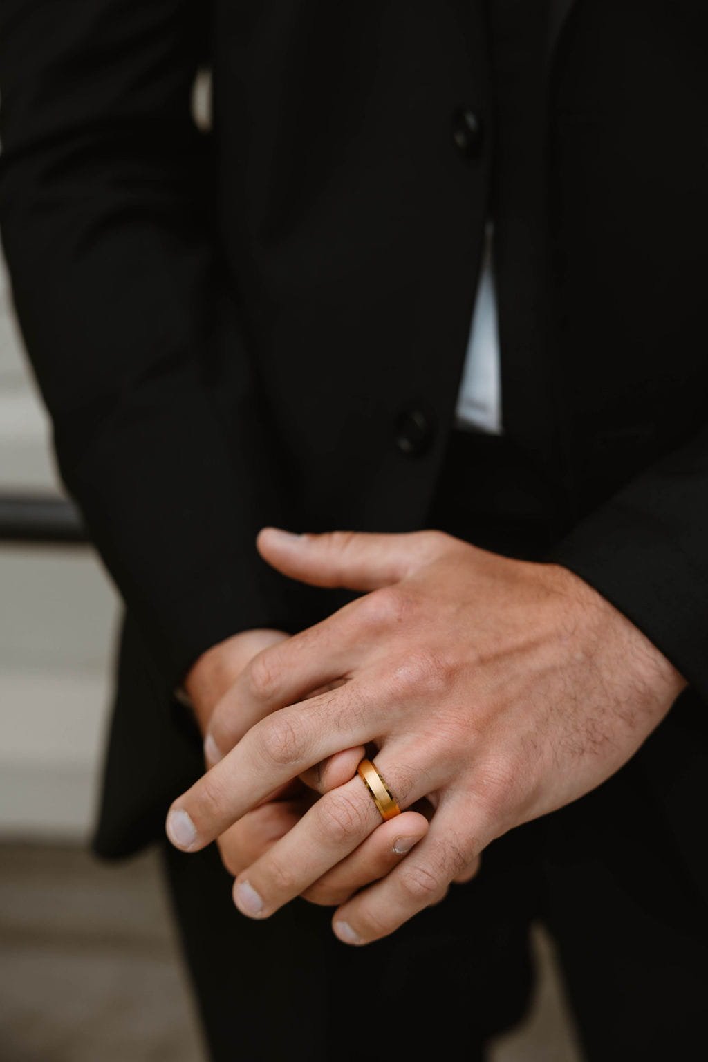 groom-gold-wedding-band-close-up.jpg