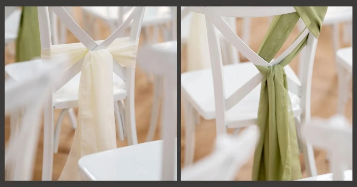 ivory and sage green sashes tied on white cross back ceremony chairs