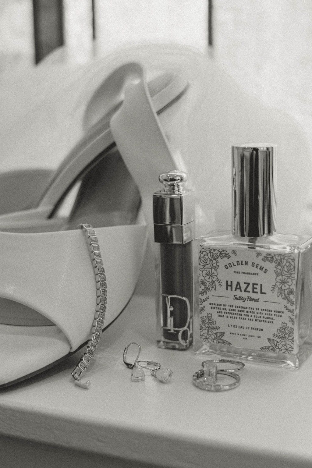 bride-shoes-perfume-makeup-jewelry-details-black-and-white.jpg