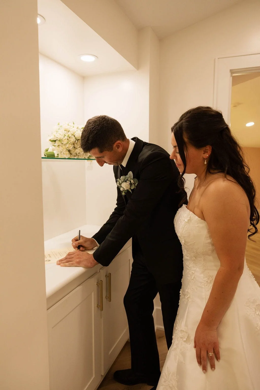 groom-signing-marriage-license.jpg
