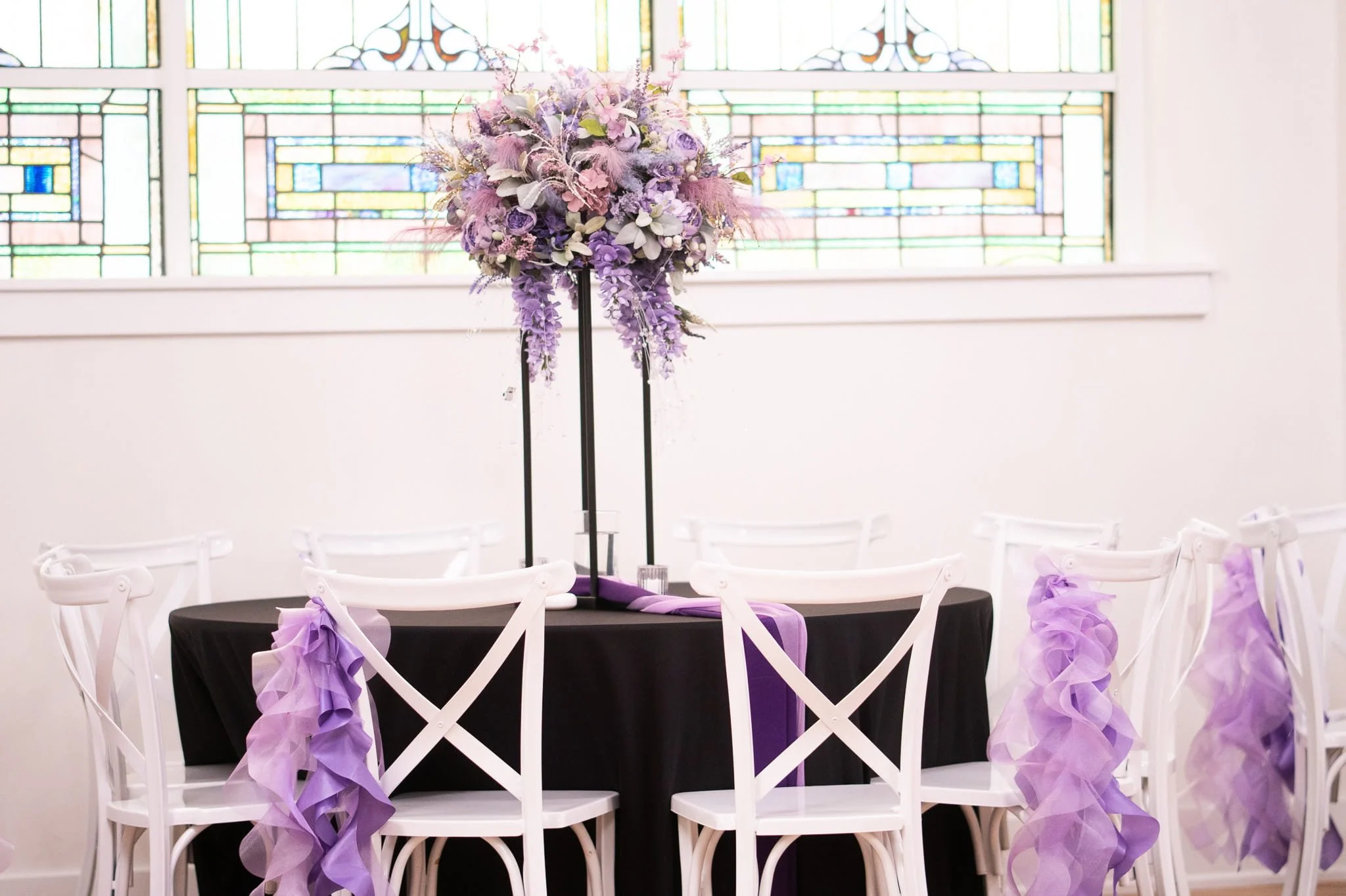kaleidoscope-weddings-enchanted-ceremony-table-ribbon-chairs.jpg
