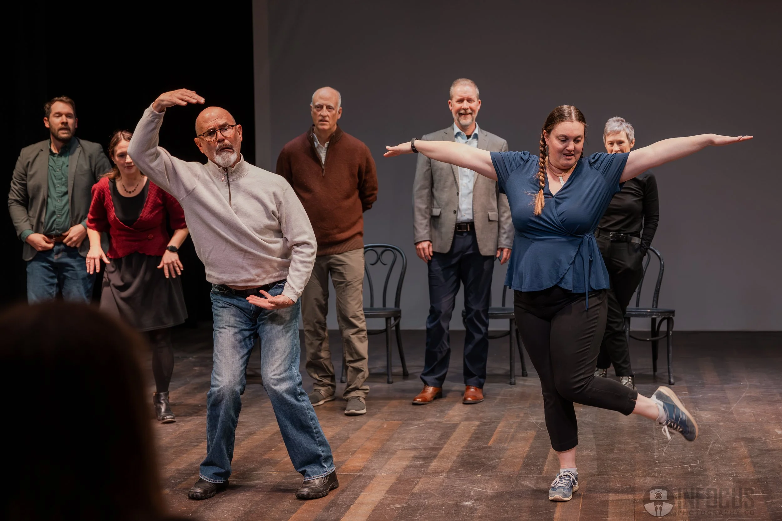 Performers in funny shaps making funny faces