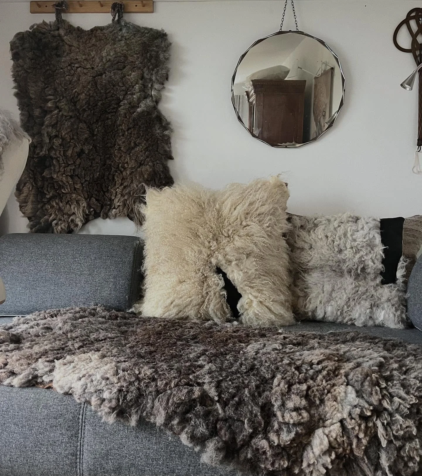 This is the largest cushion I have made to date at 65cm x 65cm. It started with hand felting a beautiful lamb fleece from one of our little twin pedigree registered Valais Blacknose babies born in July 2024. When Luna was sheared for the first time, 