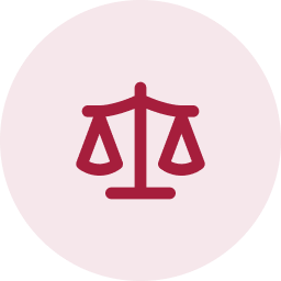 A solid maroon-colored circle on a black background.