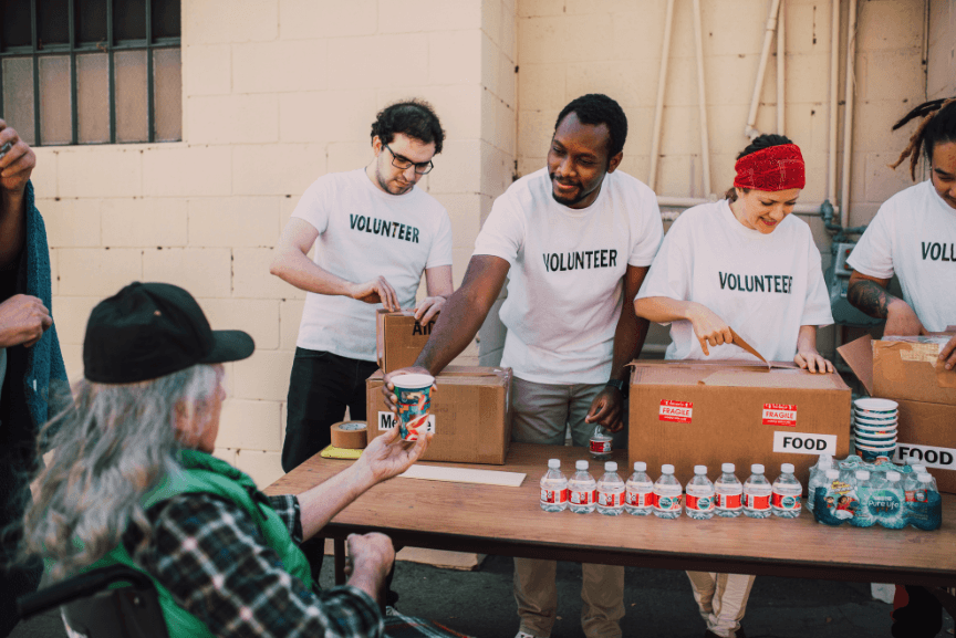 Volunteers giving donations