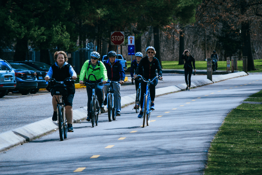 People riding bicycles