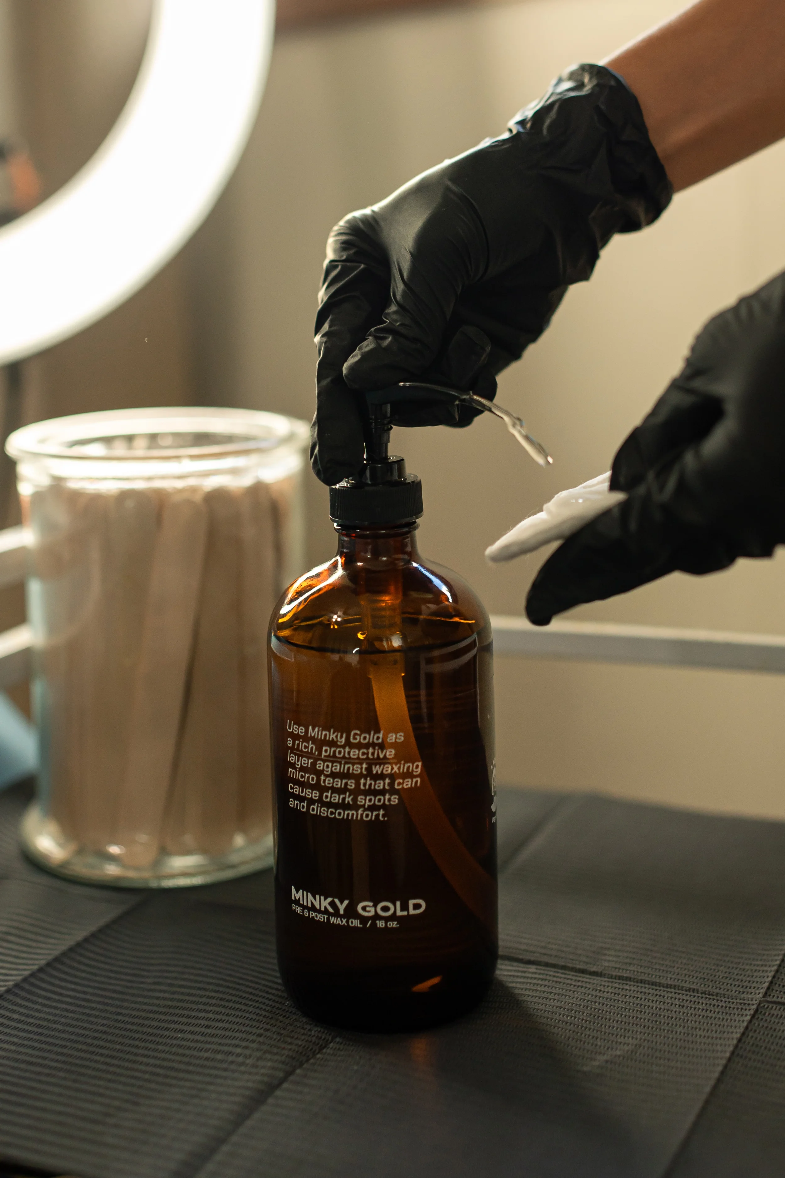 photo of waxing expert prepping for brazilian wax sensitive skin