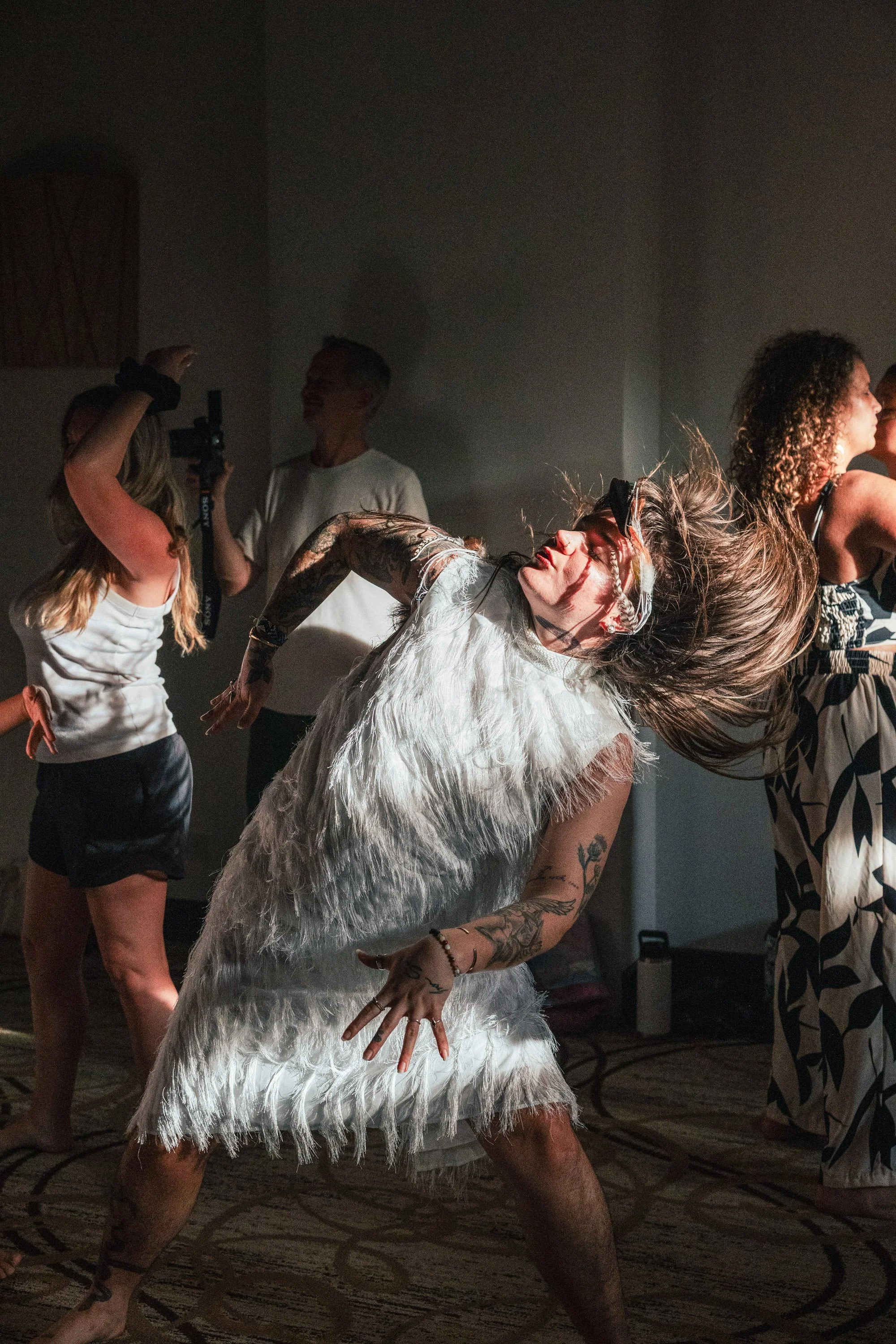 Embodied movement and somatic dance practice at Amber Hagberg's business retreat for women entrepreneurs