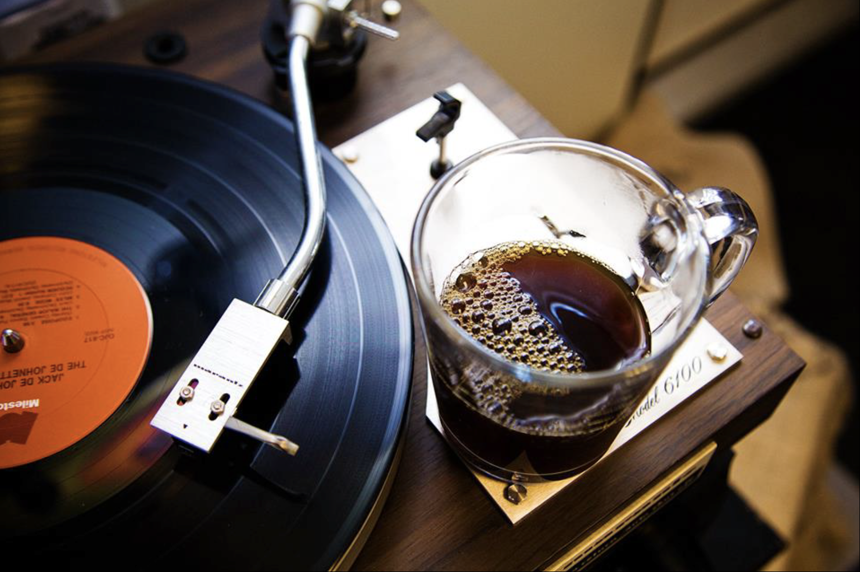 record player w/glass of coffee