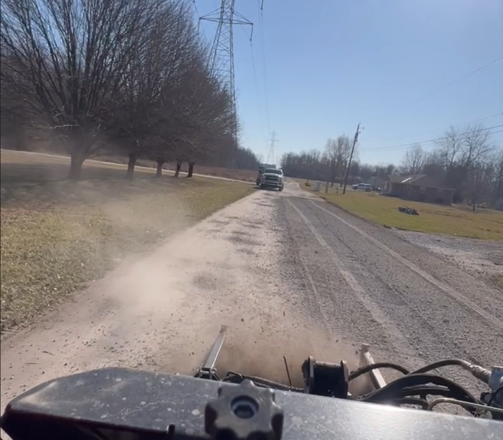 Gravel driveway repair and resurfacing with power rake in Greater Cincinnati