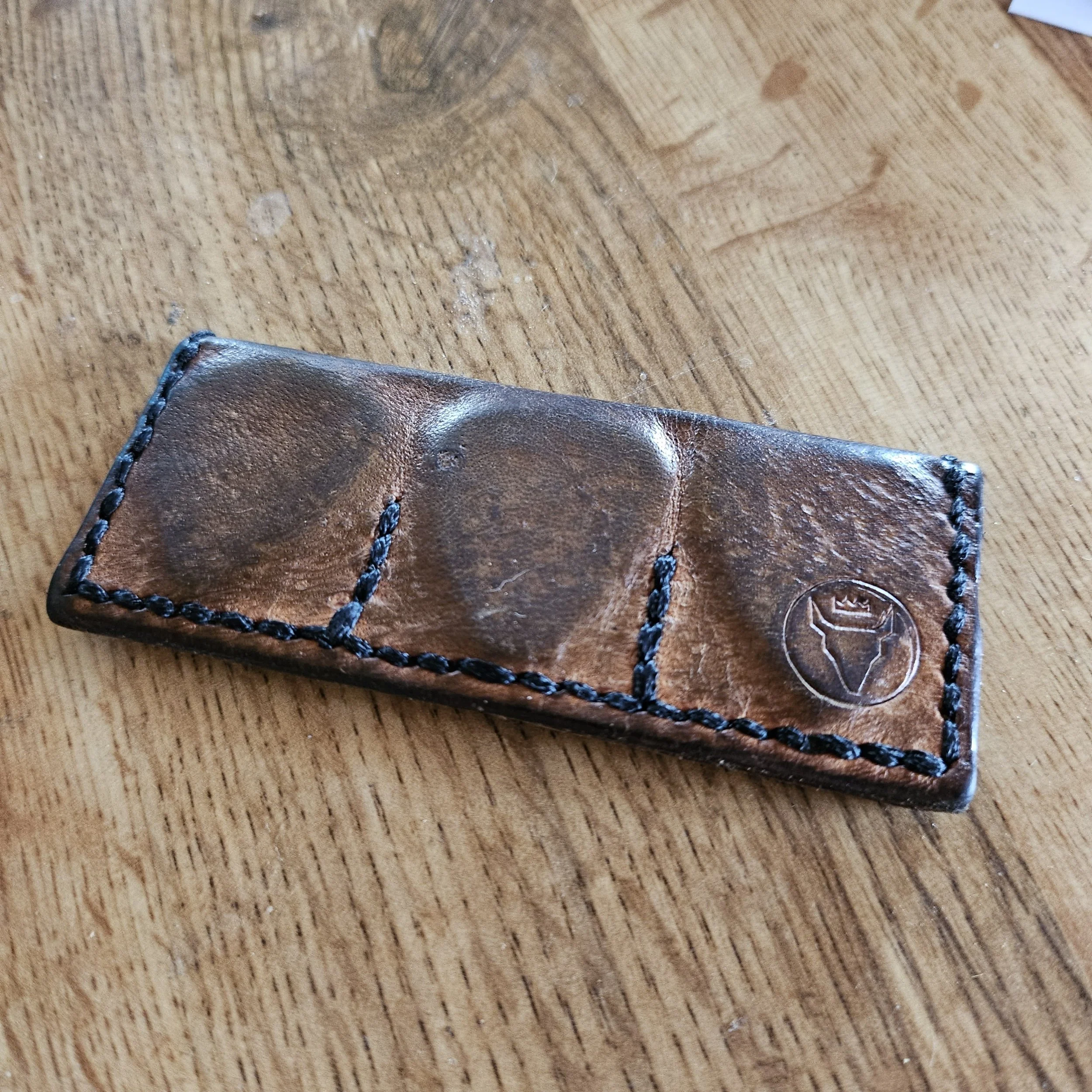 The very first Pick Pocket, after being well broken-in. Made in 2022 and still holding strong.