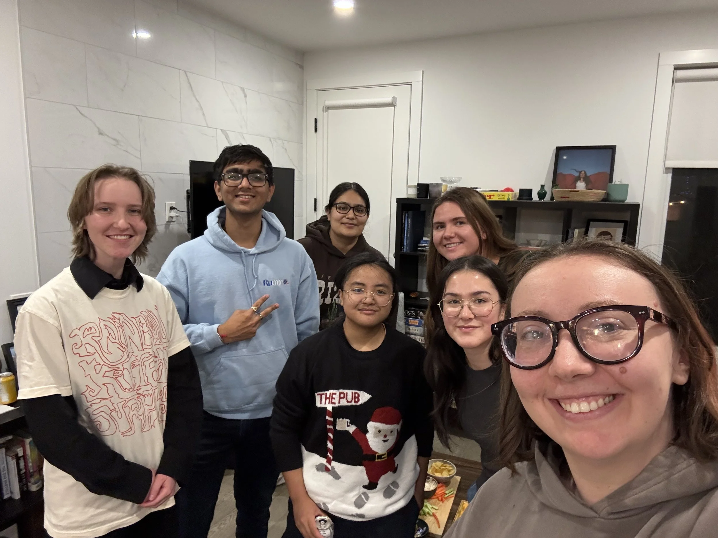 First annual Lebenzon Lab Holiday party. December 2025 - Left to right, Top: Sophie Zaplachinski (MSc, carabid collector), Ved Patel  (CMMB 528, Team HSP), Jasleen Tiwana (volunteer, soon-to-be 507 student), Alexandra Dvorak (CMMB 528, Ferroptosis en