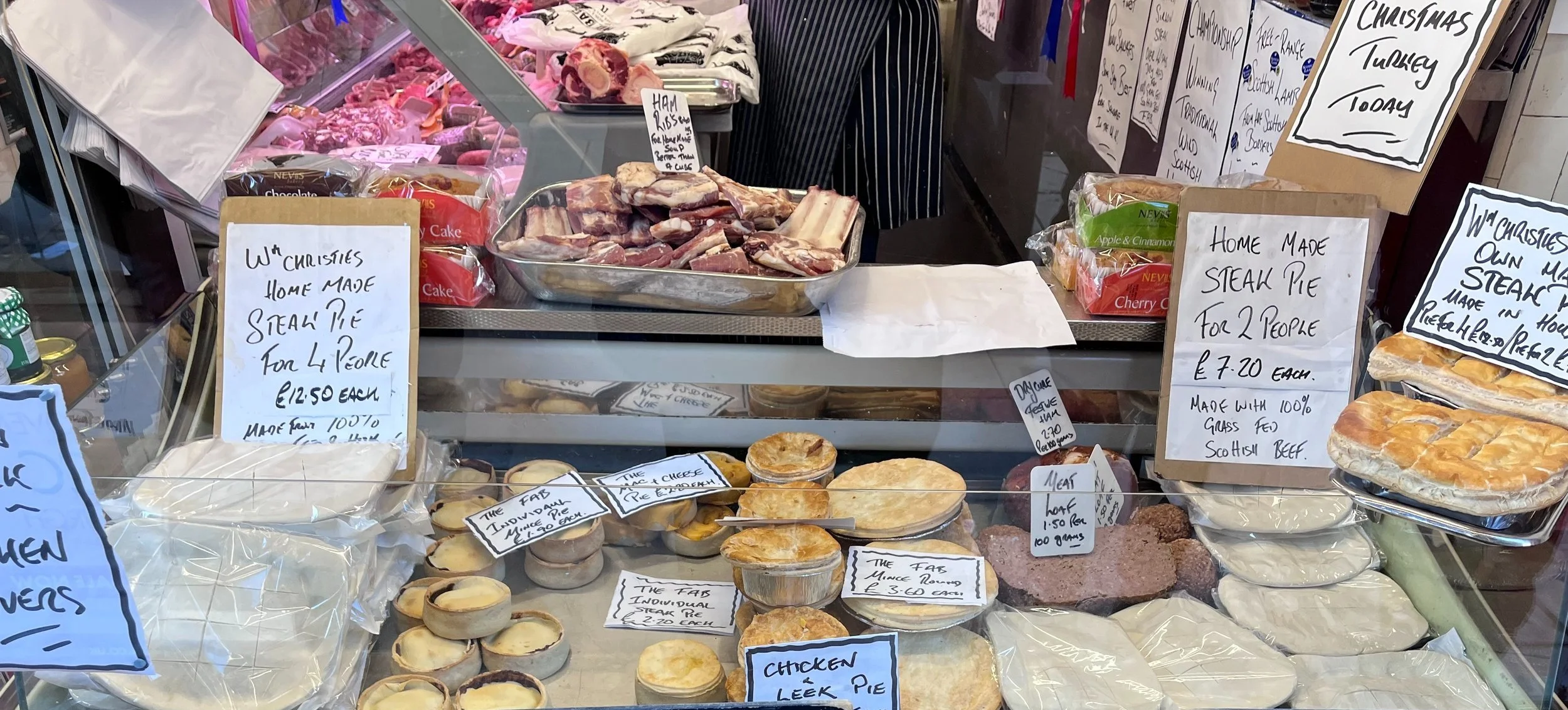 Traditional savoury pies in a butcher shop