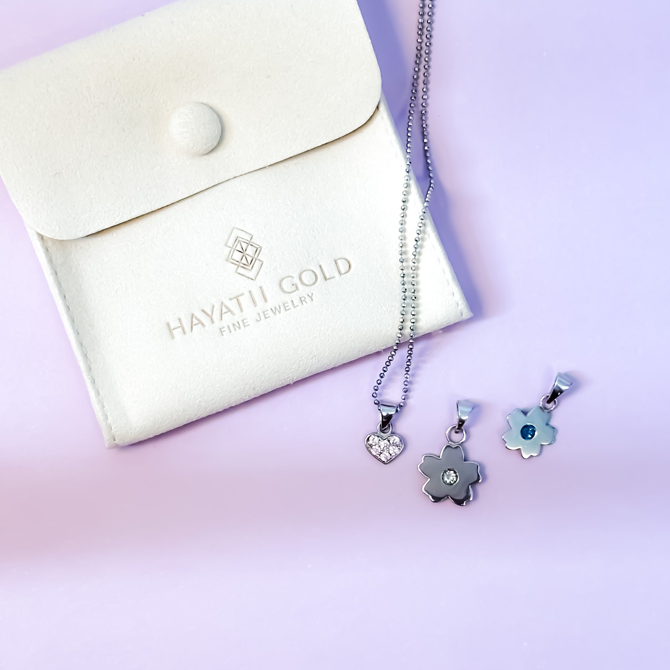 Dainty flower and heart set pendants