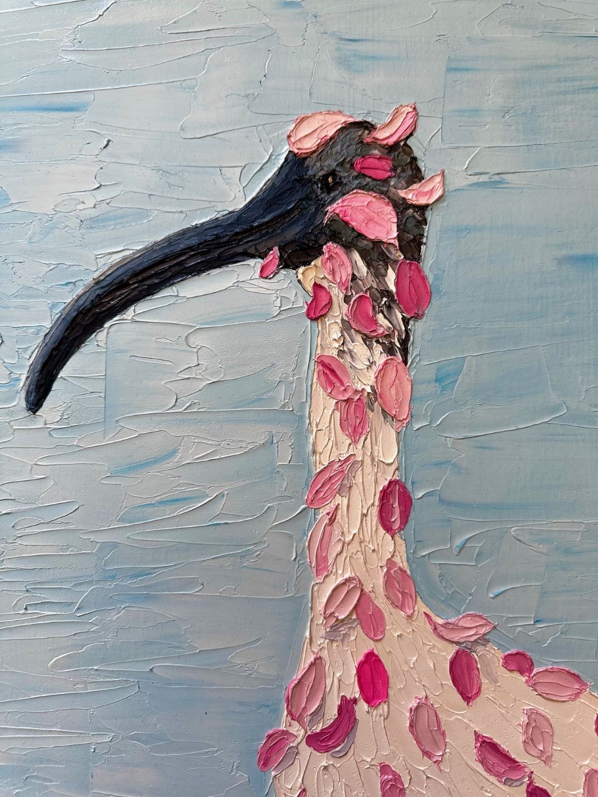 A close-up of Living the Pink Dream is an original oil painting of an Australian Ibis who wants to be pink so has stuck on lots of pink feathers. By Australian artist Cassie Holmes.