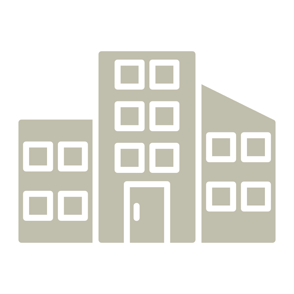 Simple icon of three buildings with multiple windows, depicted in gray against a black background.