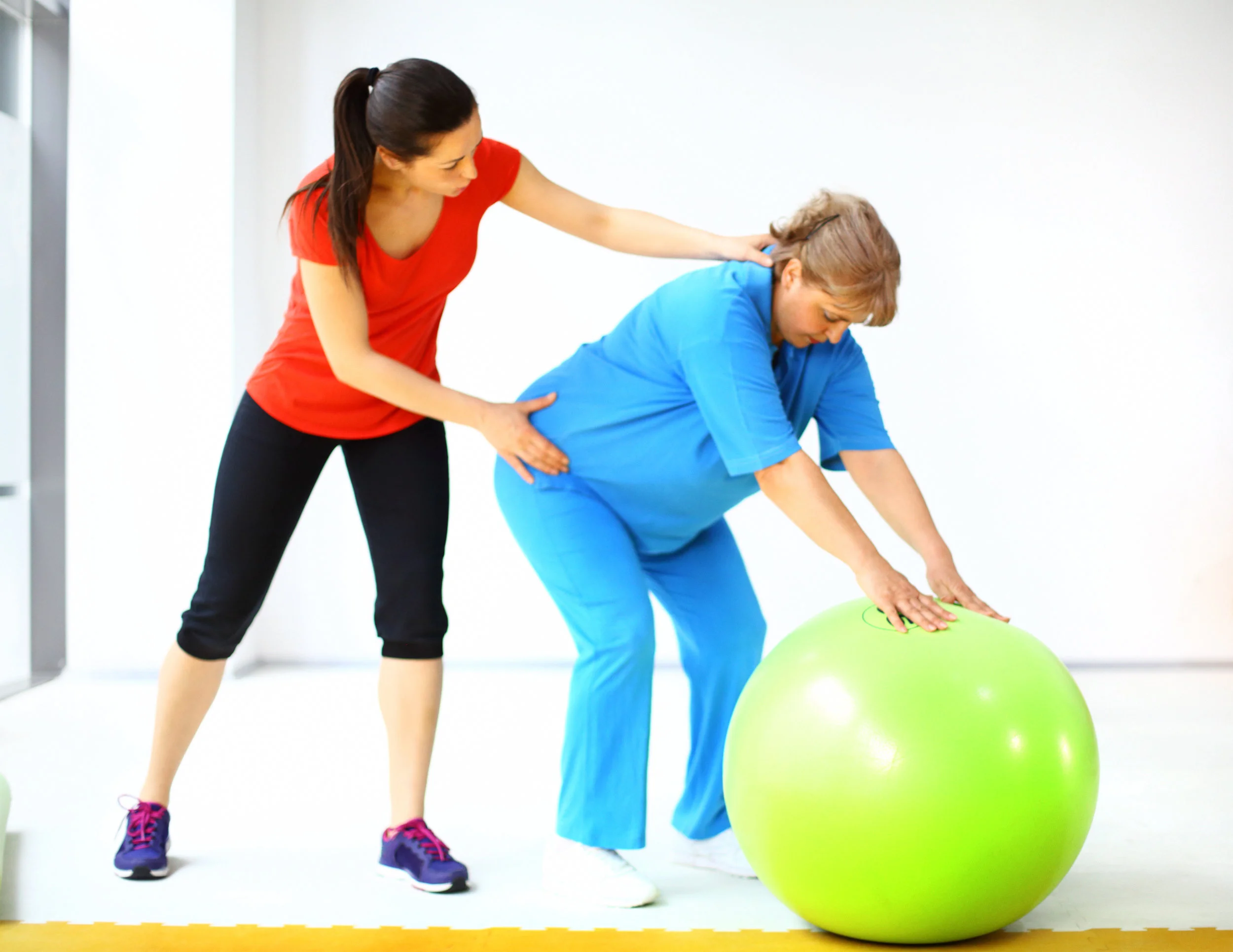 instructor with women and green ball.jpg