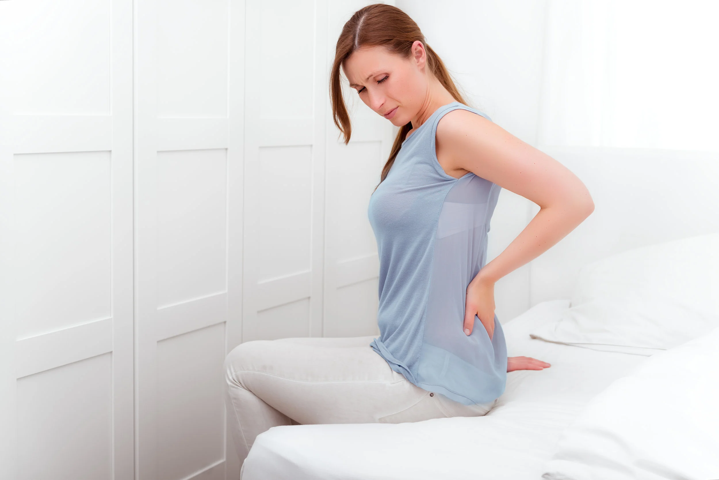 Lady Back Pain - Copy.jpg