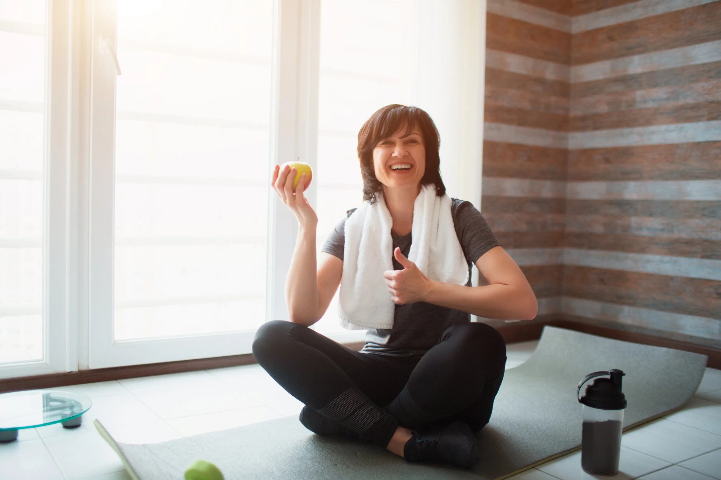 Woman laughing post workout.jpg