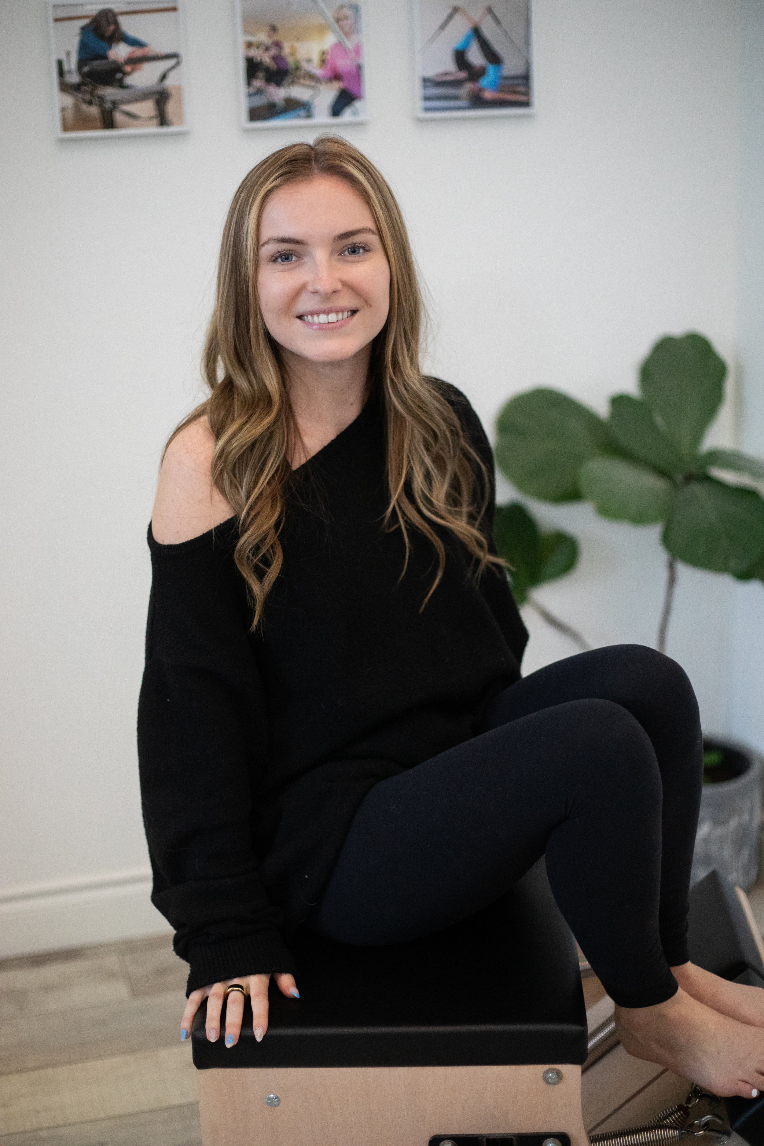 Blonde haired lady sitting on a wunda chair