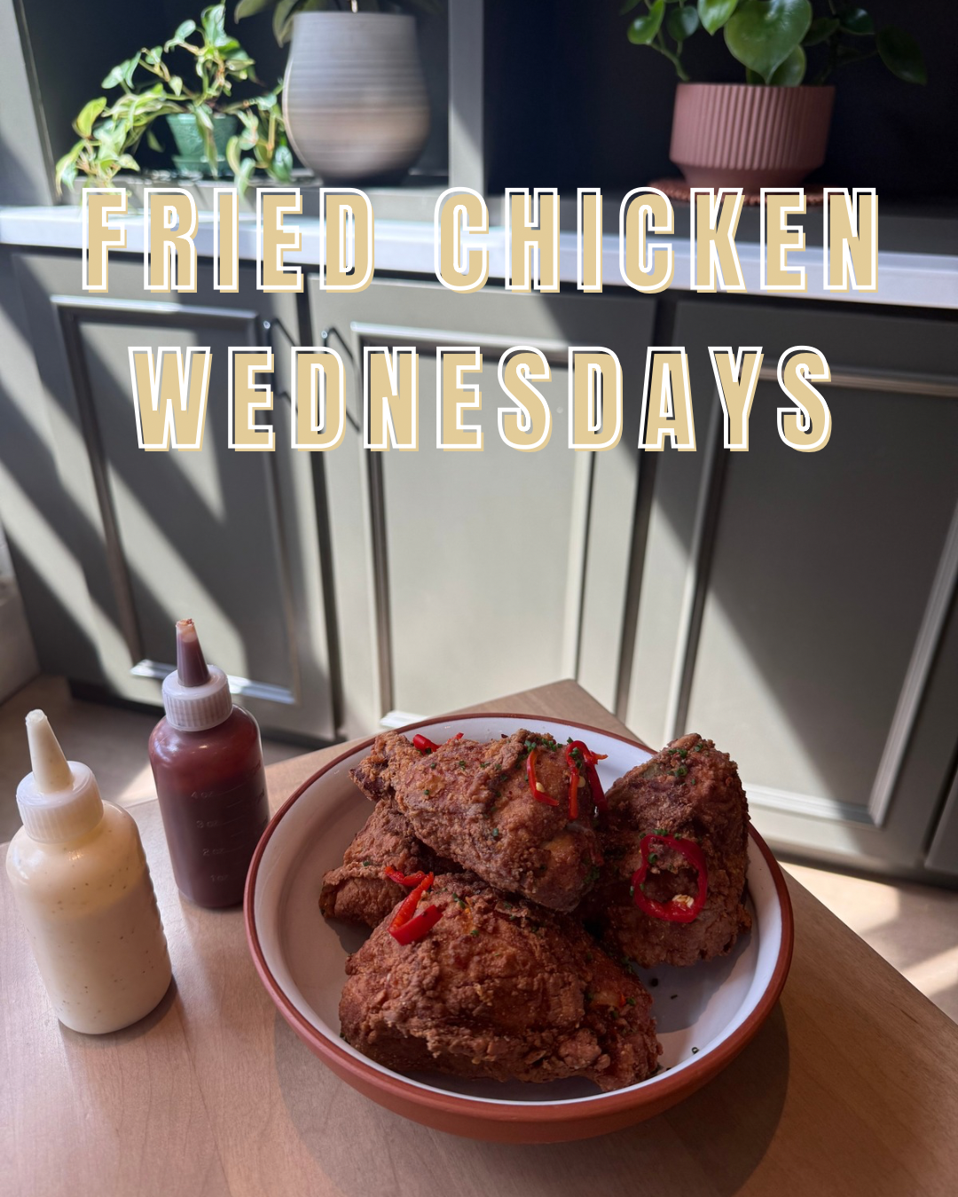 Sign advertising gluten-free fried chicken available only on Wednesday nights with a picture of fried chicken on a plate.